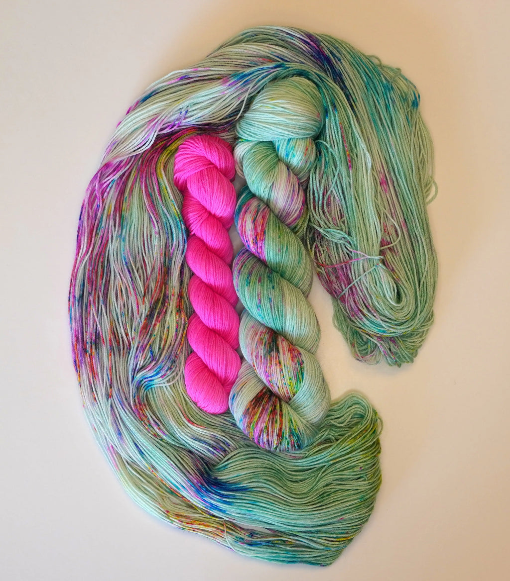 Wild Woollys Undersea Garden Fingering Sock Set yarn in mint green with pink and multicolored speckles
