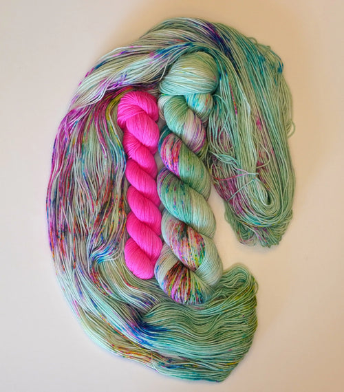 Wild Woollys Undersea Garden Fingering Sock Set yarn in mint green with pink and multicolored speckles