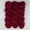 Wild Woollys Divine Wine Fingering yarn, three skeins in deep burgundy red