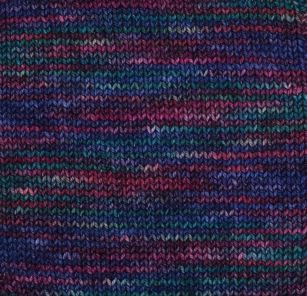 Close-up of multicolored knitted fabric with a textured pattern