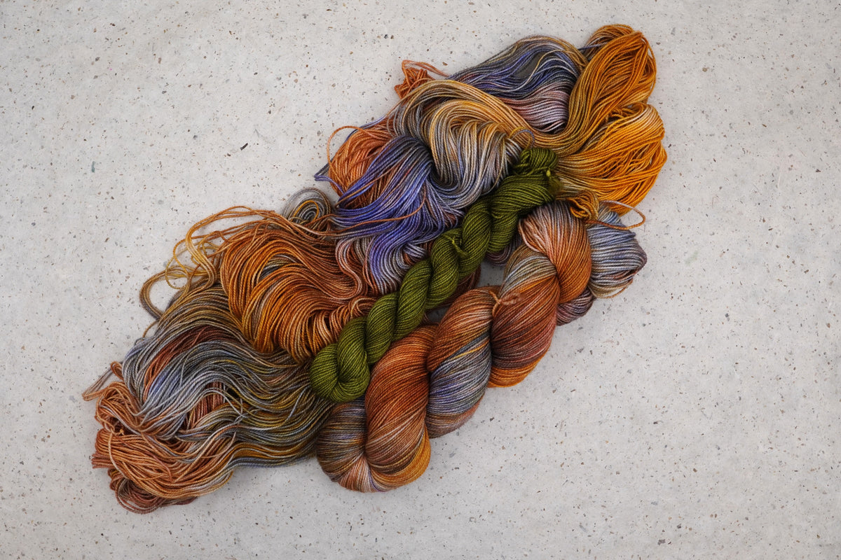 Smashing Gourds Fingering Sock Set with coordinating olive-green mini skein