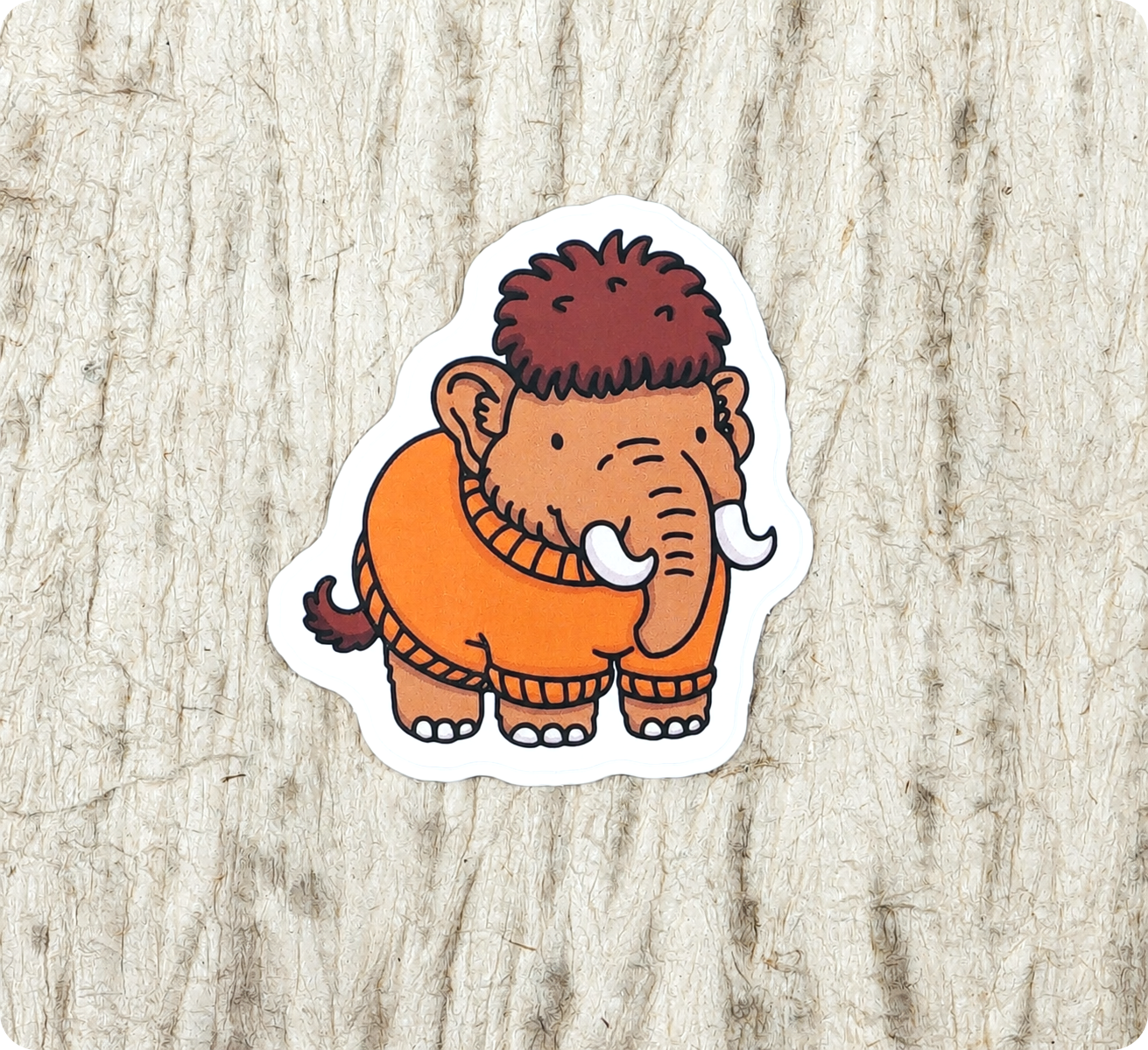Orange Wild Woollys woolly mammoth sticker wearing a cozy sweater